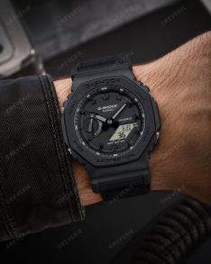 Sotilastason G-SHOCK musta Carbon Core Guard -kello Cordura-rannekkeella | GA-2100BCE-1AER